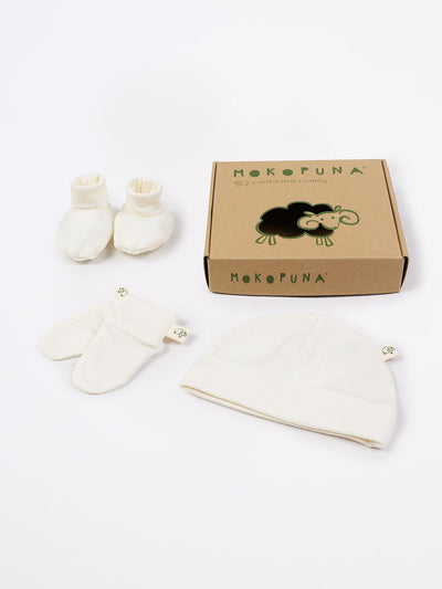 mokopuna set of merino newborn essentials, beanie, booties, scratch mittens, packed in a gift box in size NB_lily