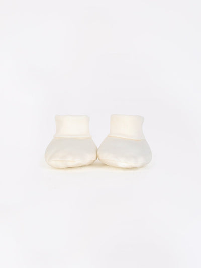 mokopuna newborn booties in merino with foldable cuffs in size NB_lily