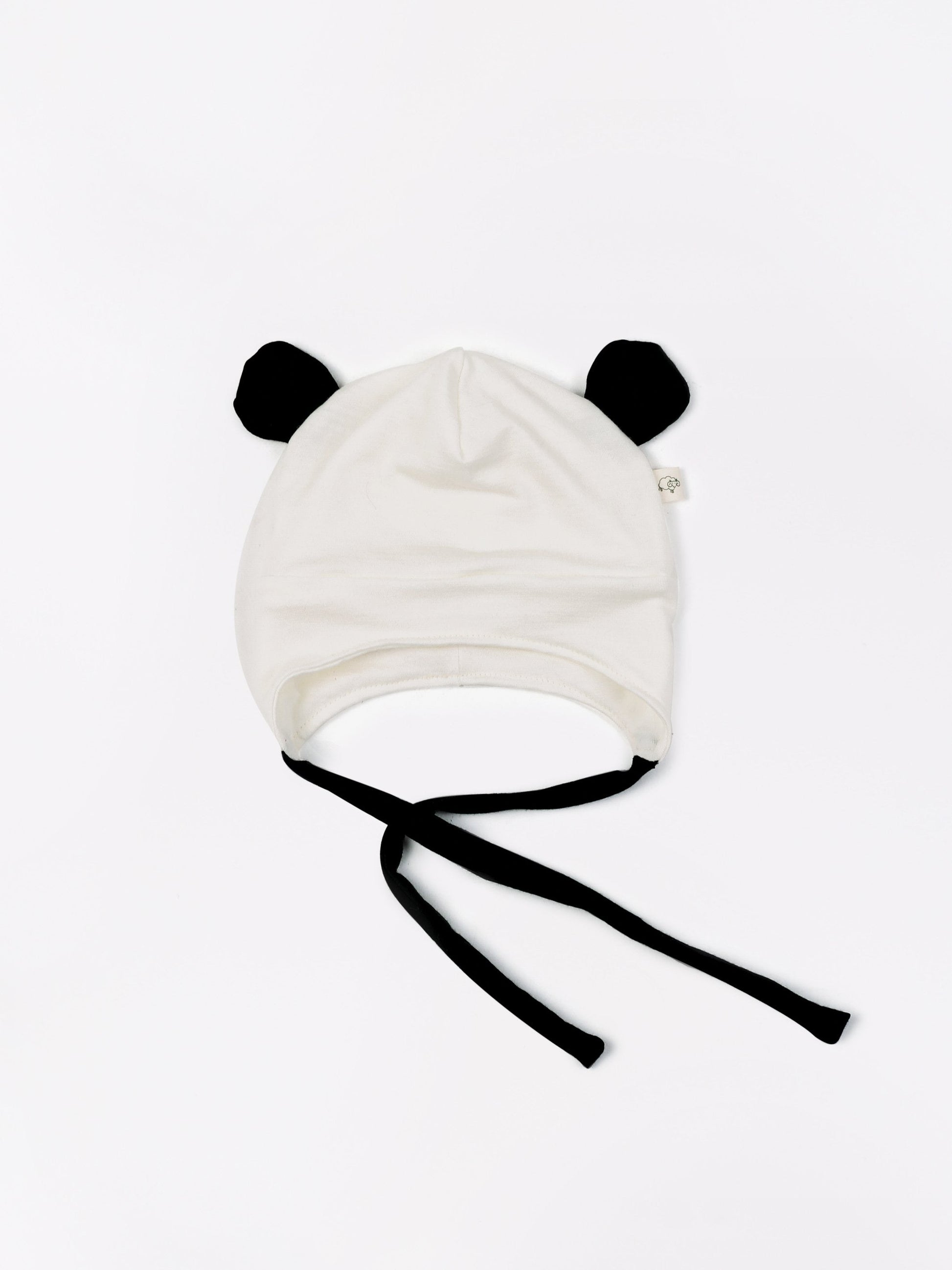 mokopuna beanie in merino with ear flaps and ties in size 2-4yrs_lily