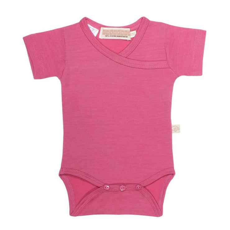 mokopuna merino shortsuit with short sleeves and wrap neckline in size NB_raspberry