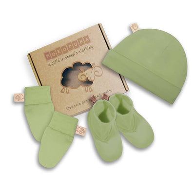mokopuna set of merino newborn essentials, beanie, booties, scratch mittens, packed in a gift box in size NB_pistachio