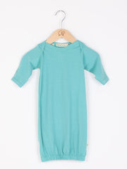 mokopuna sleepsuit gown in merino with envelope neckline, built-in mitts and elastic bottom in size NB_tealeaf