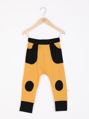 mokopuna slouch trackpants in merino, with elastic waistband, pockets and knee pads in size 4_butterscotch