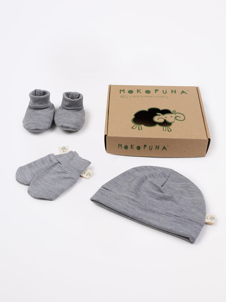 mokopuna set of merino newborn essentials, beanie, booties, scratch mittens, packed in a gift box in size NB_mist